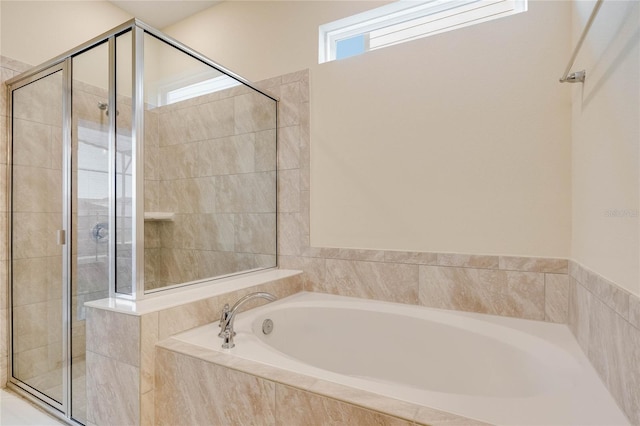 1221 Aloha Blvd, Davenport, FL 33897 - full bath featuring a shower stall and a garden tub