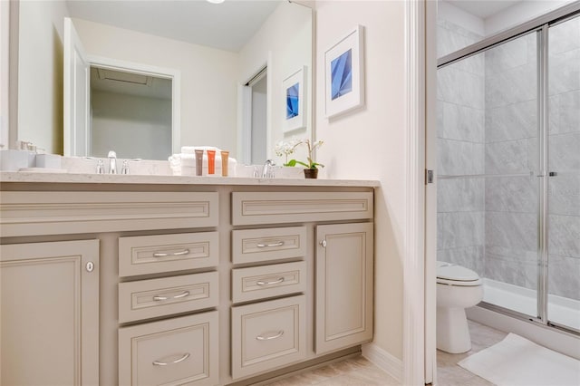 1221 Aloha Blvd, Davenport, FL 33897 - bathroom with a stall shower, toilet, and double vanity