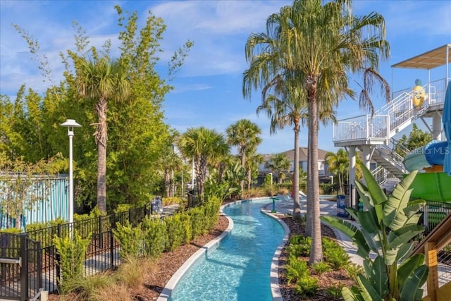 1221 Aloha Blvd, Davenport, FL 33897 - surrounding community with fence and a swimming pool