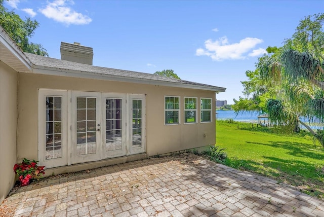 633 Balmoral Rd, Winter Park, FL 32789 - view of patio / terrace featuring french doors and a water view