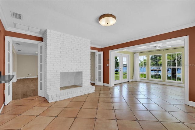 633 Balmoral Rd, Winter Park, FL 32789 - unfurnished living room featuring crown molding, baseboards, a brick fireplace, ceiling fan, and light tile patterned flooring