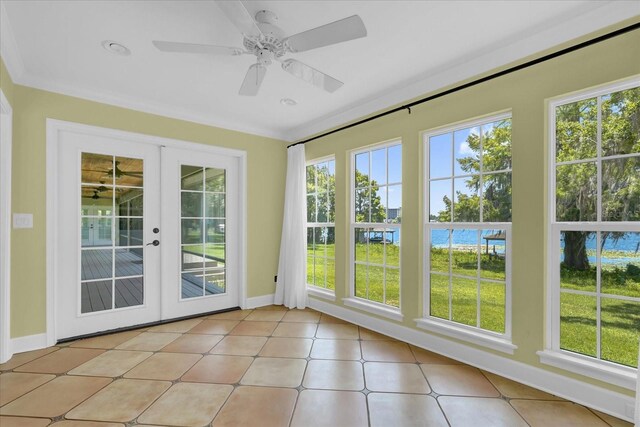 633 Balmoral Rd, Winter Park, FL 32789 - unfurnished sunroom featuring french doors and baseboards