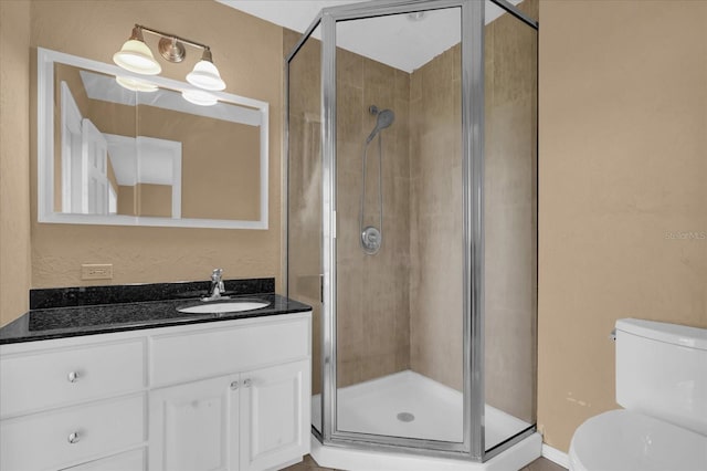 633 Balmoral Rd, Winter Park, FL 32789 - bathroom featuring a shower stall, toilet, and vanity