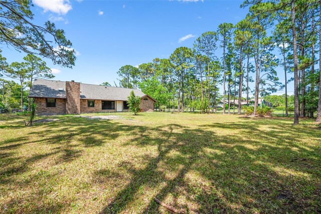 4206 Hield Rd NW, Palm Bay, FL 32907 - view of grassy yard