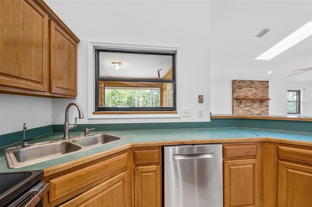 4206 Hield Rd NW, Palm Bay, FL 32907 - kitchen with dishwasher, a skylight, a sink, and brown cabinets