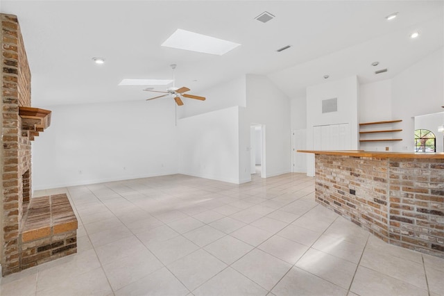 4206 Hield Rd NW, Palm Bay, FL 32907 - unfurnished living room with a skylight, light tile patterned floors, ceiling fan, high vaulted ceiling, and recessed lighting