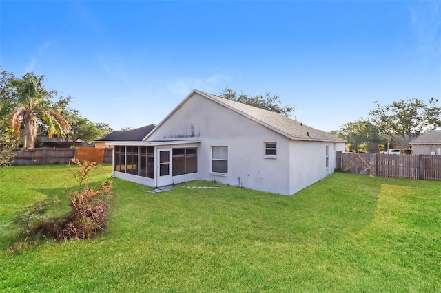 24237 Rolling View Ct, Lutz, FL 33559 - rear view of house with a sunroom and stucco siding