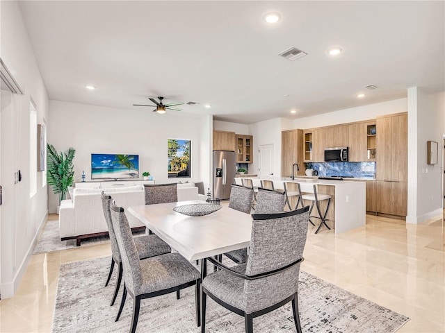 2545 NW 22nd Pl, Cape Coral, FL 33993 - dining space featuring recessed lighting, ceiling fan, and baseboards