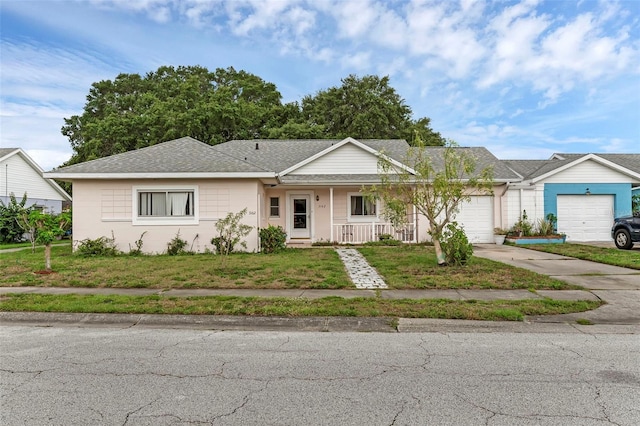 3162 Little Sound Dr, Orlando, FL 32827 - ranch-style home featuring an attached garage, covered porch, concrete driveway, a front yard, and roof with shingles