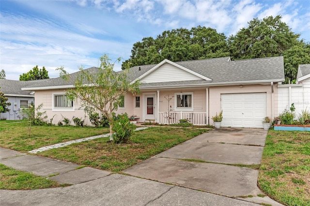 3162 Little Sound Dr, Orlando, FL 32827 - ranch-style house with a porch, a front yard, concrete driveway, an attached garage, and roof with shingles
