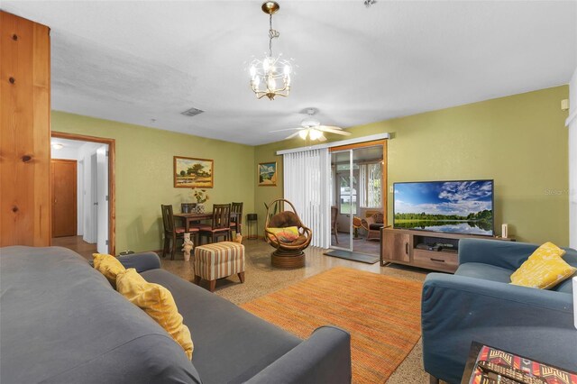 3162 Little Sound Dr, Orlando, FL 32827 - living room with a chandelier and a ceiling fan