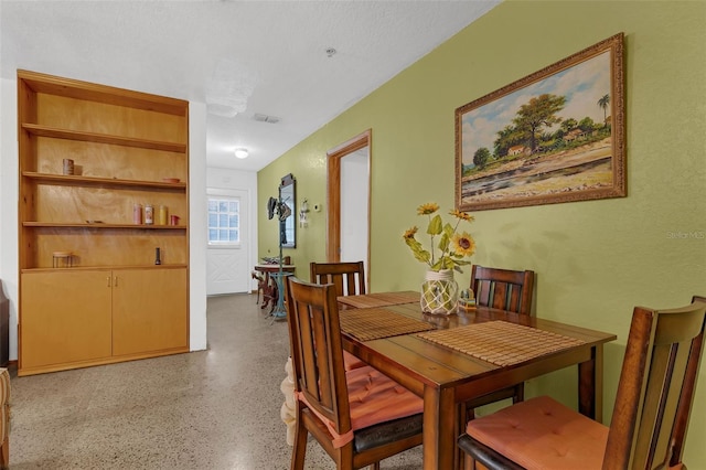 3162 Little Sound Dr, Orlando, FL 32827 - dining area with dark speckled floor
