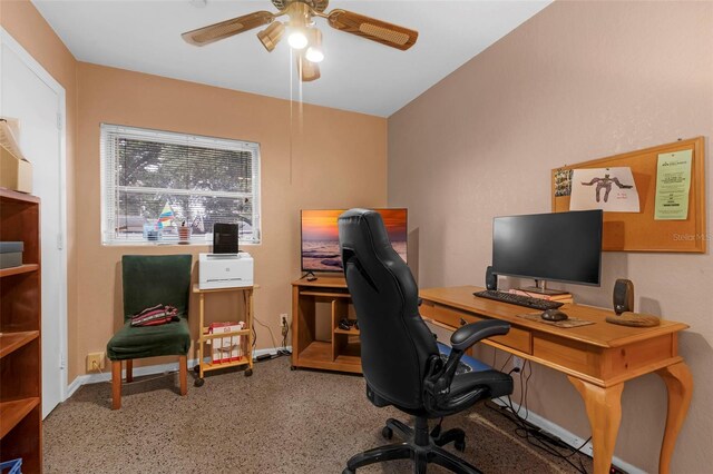 3162 Little Sound Dr, Orlando, FL 32827 - home office featuring ceiling fan, baseboards, and speckle patterned floor