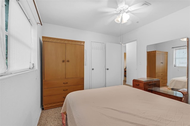 3162 Little Sound Dr, Orlando, FL 32827 - bedroom featuring dark speckled floor and ceiling fan