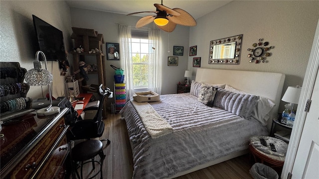 bedroom with wood finished floors and ceiling fan