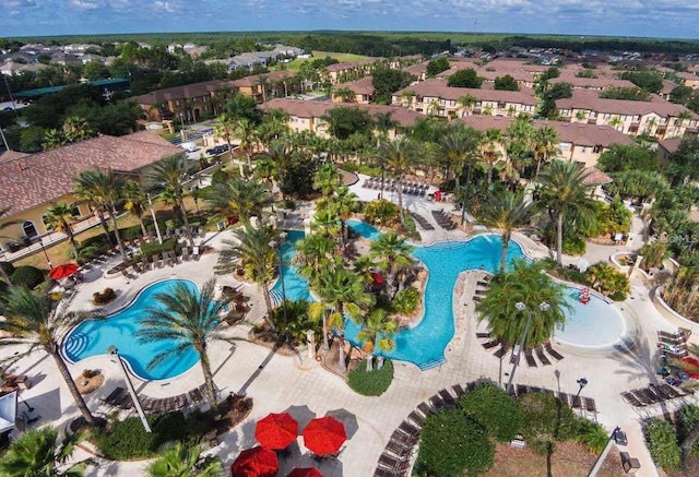 4031 Calabria Ave, Davenport, FL 33897 - aerial perspective of suburban area featuring a pool area