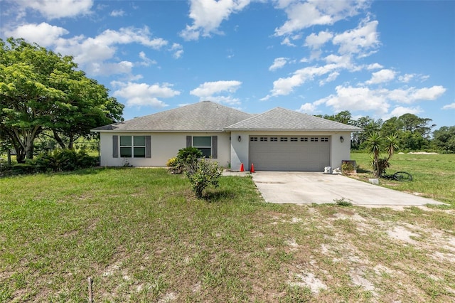 ranch-style home featuring a garage, concrete driveway, stucco siding, and a front yard