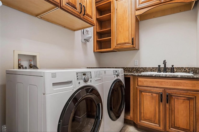 laundry area featuring cabinet space and independent washer and dryer
