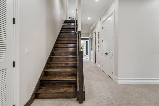 stairway with carpet, baseboards, and recessed lighting