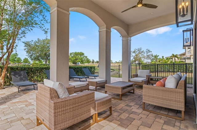 view of patio / terrace featuring an outdoor living space and a ceiling fan
