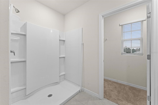 979 Sun Burst Rd, Winter Haven, FL 33880 - full bathroom featuring a shower stall, baseboards, and tile patterned floors