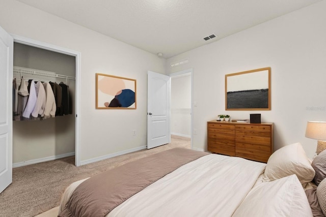 979 Sun Burst Rd, Winter Haven, FL 33880 - carpeted bedroom with baseboards and a closet