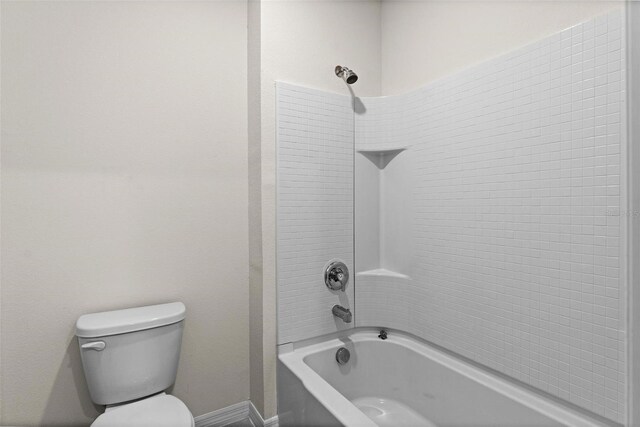 979 Sun Burst Rd, Winter Haven, FL 33880 - bathroom featuring toilet and washtub / shower combination