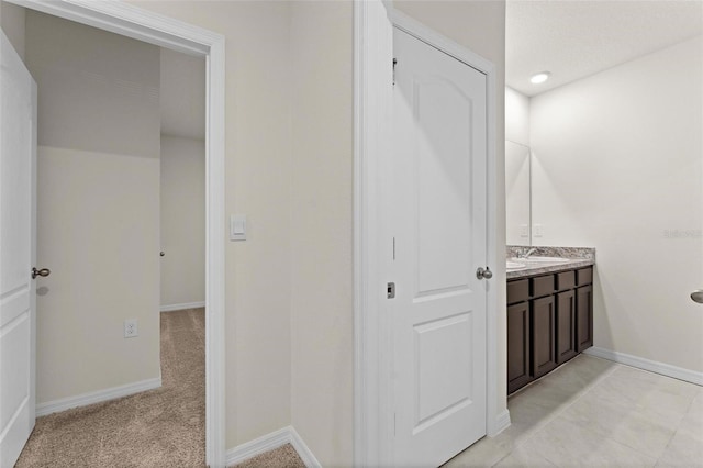 979 Sun Burst Rd, Winter Haven, FL 33880 - bathroom featuring vanity and baseboards