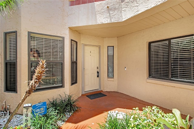 7858 Sugar View Ct Unit 7858, Orlando, FL 32819 - entrance to property with stucco siding