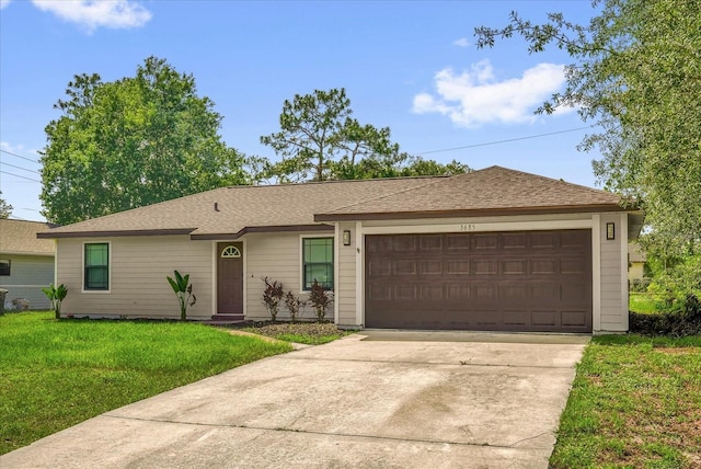 3685 Sunday Dr, Deltona, FL 32738 - single story home with a front yard, an attached garage, concrete driveway, and a shingled roof