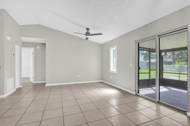 3685 Sunday Dr, Deltona, FL 32738 - empty room featuring lofted ceiling, a ceiling fan, baseboards, and light tile patterned flooring