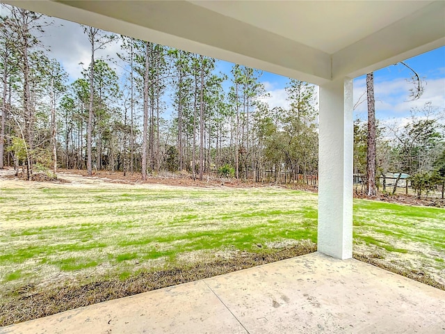 8258 SW 136th Ter, Dunnellon, FL 34432 - view of green lawn featuring a patio area