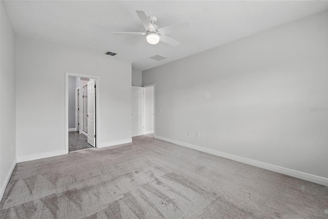 unfurnished bedroom featuring carpet flooring, baseboards, and ceiling fan