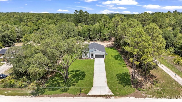 13101 SW 85th Pl, Dunnellon, FL 34432 - aerial view of property and surrounding area featuring a heavily wooded area