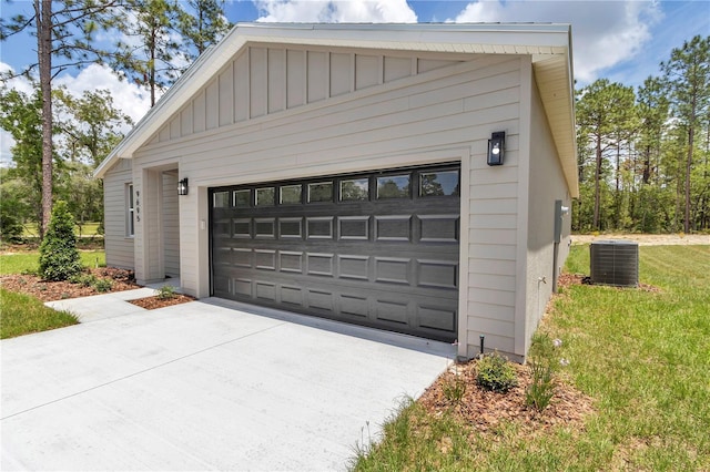 9695 SW 125 Court Rd, Dunnellon, FL 34432 - detached garage featuring central air condition unit