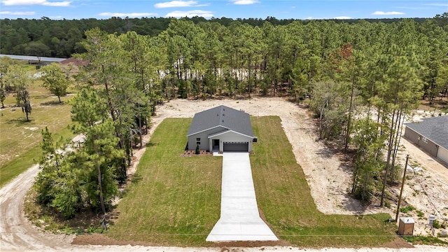 9695 SW 125 Court Rd, Dunnellon, FL 34432 - view of subject property with a heavily wooded area