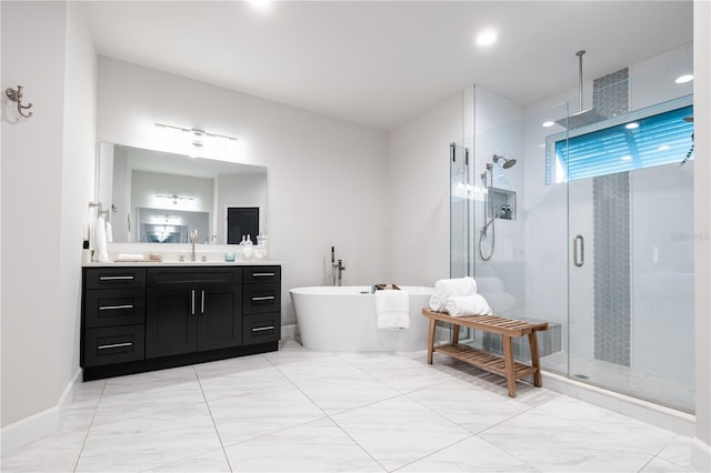 full bath with a stall shower, vanity, a soaking tub, and recessed lighting