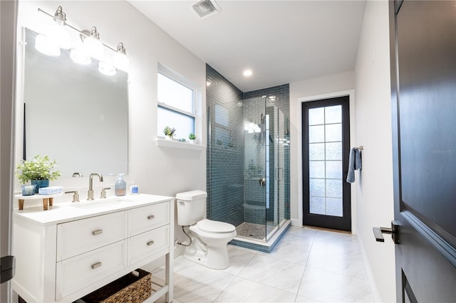full bathroom with toilet, a stall shower, baseboards, vanity, and marble finish floors