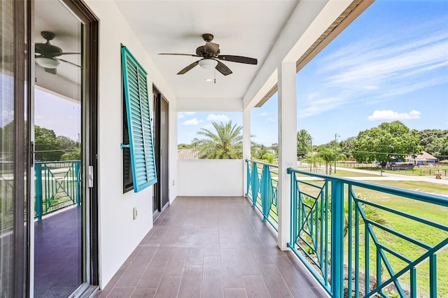 balcony featuring a ceiling fan