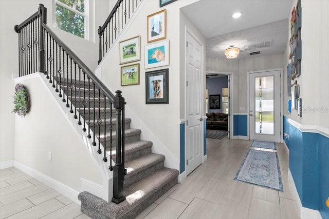 14639 Winter Stay Dr, Winter Garden, FL 34787 - foyer entrance featuring baseboards, stairway, and recessed lighting