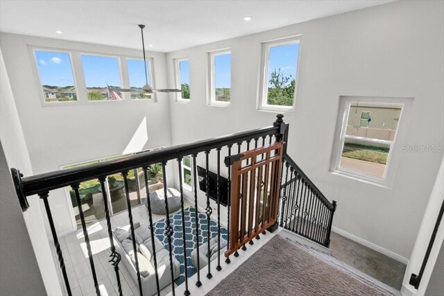 14639 Winter Stay Dr, Winter Garden, FL 34787 - stairs featuring recessed lighting and baseboards