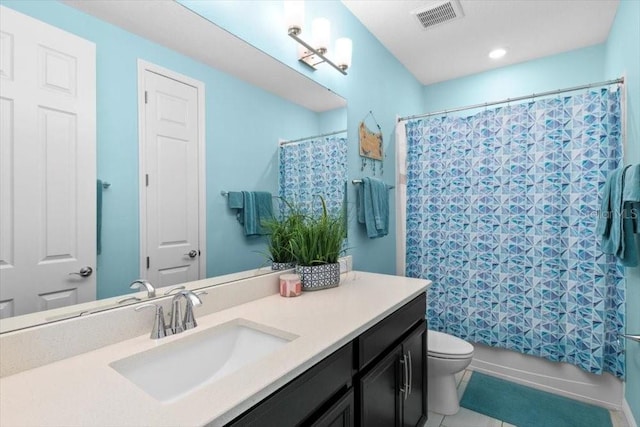 14639 Winter Stay Dr, Winter Garden, FL 34787 - full bath featuring vanity, toilet, shower / tub combo with curtain, tile patterned flooring, and recessed lighting