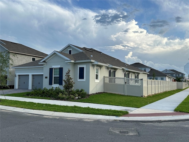 view of front of house featuring fence, stucco siding, a garage, driveway, and roof with shingles