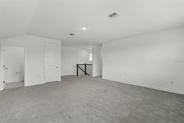 15161 Lake Bessie Loop, Winter Garden, FL 34787 - bonus room with carpet flooring, baseboards, recessed lighting, and lofted ceiling