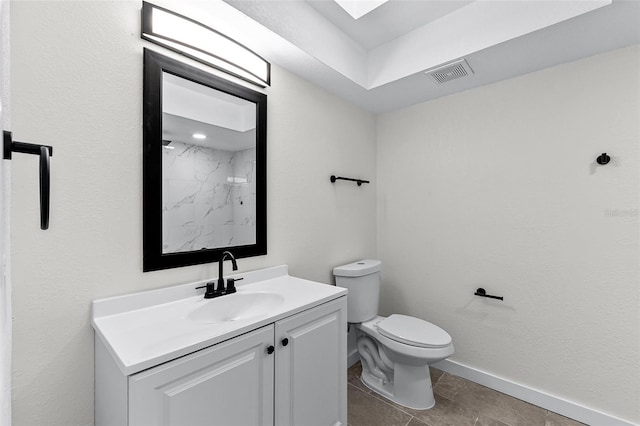 7085 Willowwood St, Orlando, FL 32818 - full bathroom with toilet, vanity, a marble finish shower, baseboards, and tile patterned flooring