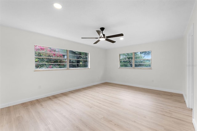 7085 Willowwood St, Orlando, FL 32818 - spare room featuring a ceiling fan, wood finished floors, baseboards, and recessed lighting
