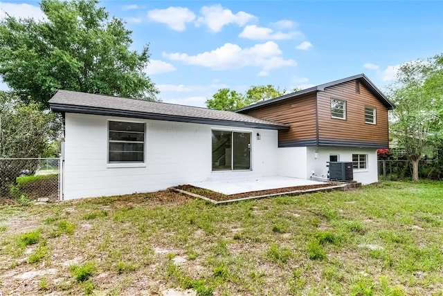 7085 Willowwood St, Orlando, FL 32818 - back of house featuring a patio area and central AC unit