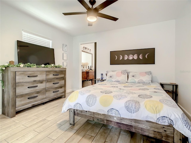 bedroom with wood finished floors and a ceiling fan