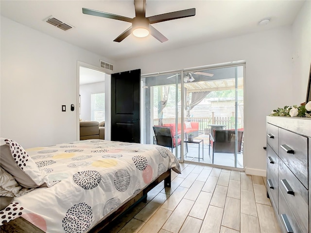 bedroom with access to exterior and ceiling fan