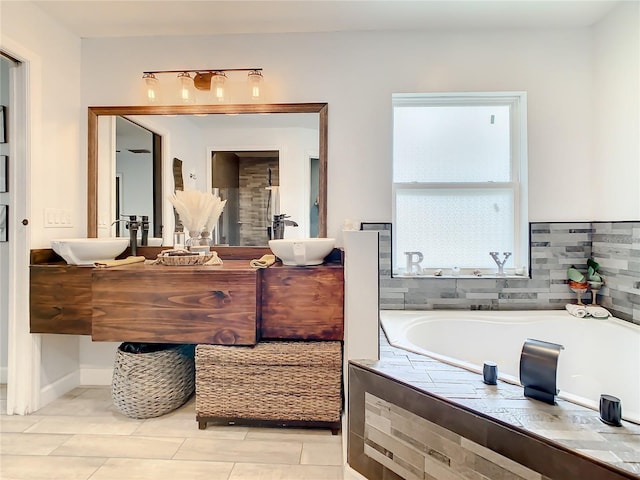 full bathroom with a garden tub, double vanity, and a shower